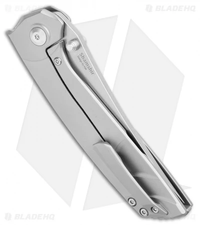 Kizer Shamshir Frame Lock Flipper Knife Contoured Titanium (3.24" Satin) Ki4517 Kizer Shamshir Frame Lock Flipper Knife Contoured Titanium (3.24" Satin) Ki4517 -Blade HQ Store Kizer Shamshir FL Contoured Ti Satin BHQ 106889 jr side