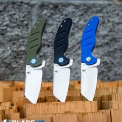 Kizer Vanguard Mini Sheepdog C01C Liner Lock Knife OD Green G-10 (2.6" Satin) 7 Kizer Vanguard Mini Sheepdog C01C Liner Lock Knife OD Green G-10 (2.6" Satin) -Blade HQ Store Kizer Vanguard Mini Sheepdog C01C Liner Lock Knife G 10 Satin BHQ80398 kp stabbed in wood web